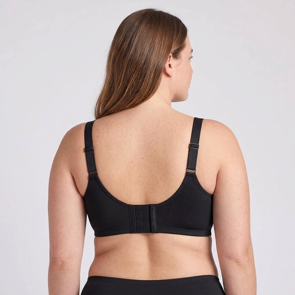 Lovelle Grace in black from behind: wide straps and three rows of hooks